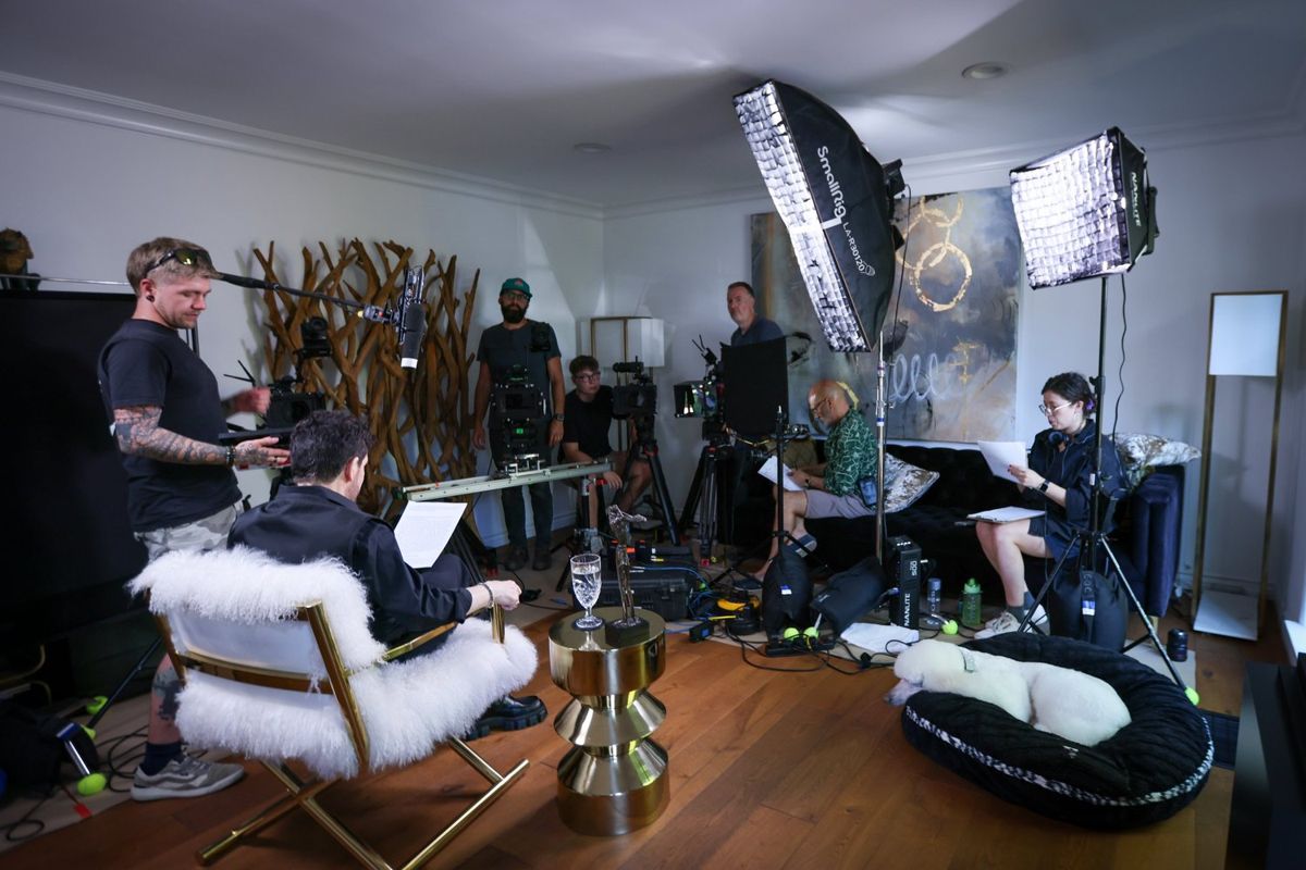 Crew lighting a lounge set